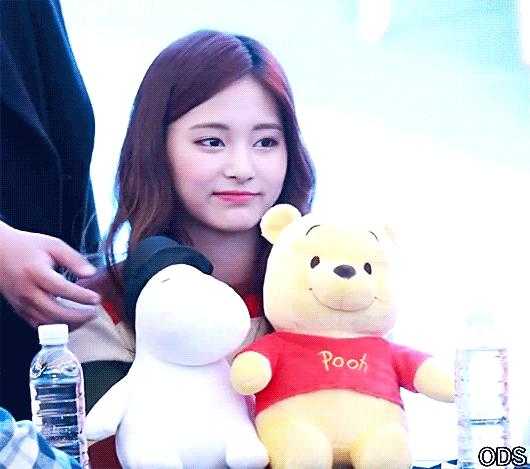 Tzuyu doesn't want to take the doll away.