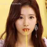 TWICE Sana Tzuyu spilling juice from her mouth.