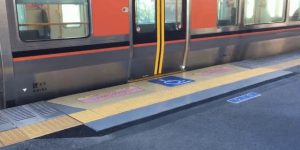 The new boarding system for the disabled on the Japanese subway platform.