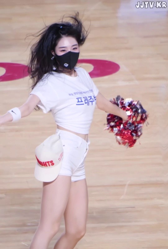 Tight white T-shirt, white shorts, Yongkyung cheerleader.