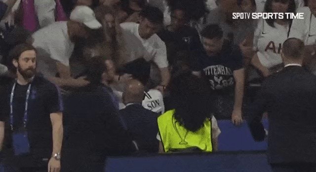 Father who hugs son who lost in final gif