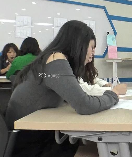 Somi, who uses her desk comfortably.