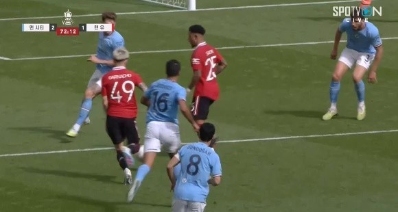 Man City vs. United. Garnacho's curling kick is slightly off the mark Shaking