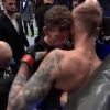 UFC fighter's behavior after being hit by punch GIF