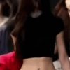 ITZY YUNA wearing an ITZY mask with a nice waistline belly button