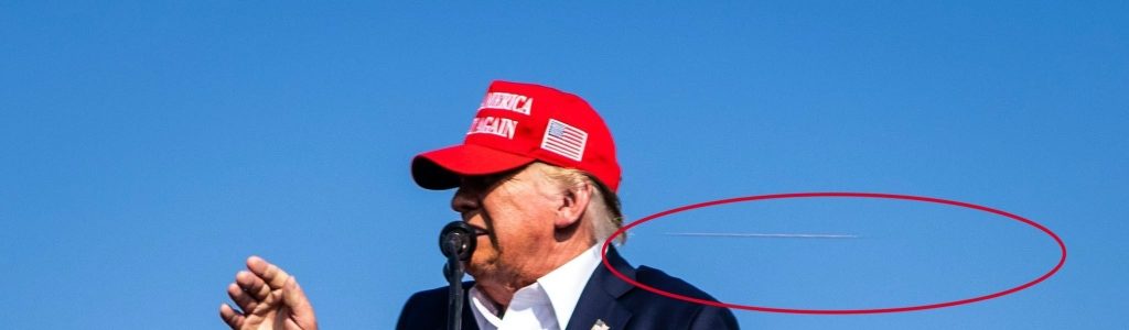 A bullet flies behind Trump, captured by a New York Times photographer.