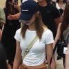 TWICE Tzuyu with a bulging white tee with a split crossback arrives at Gimpo Airport