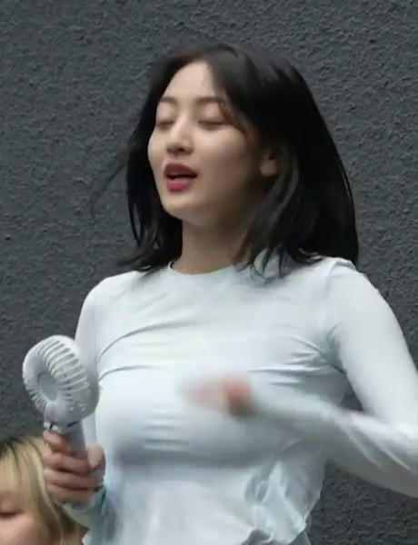 Twice Jihyo, a light blue crop top with a slightly transparent bra, heavy volume