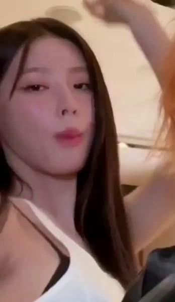 Miyeon, the girls wearing white string tank tops