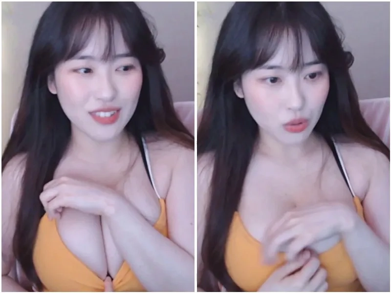 Soram-ing inserts her fingers into the orange cleavage.